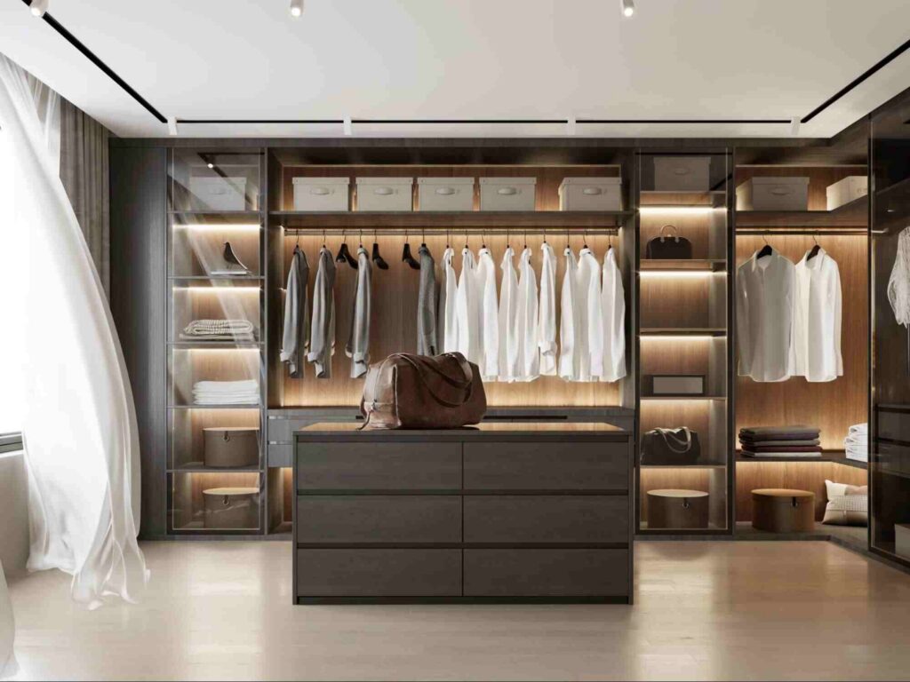 Custom walk-in closet with built-in shelving, drawers, and hanging storage, showcasing outsourced custom closet manufacturing solutions.